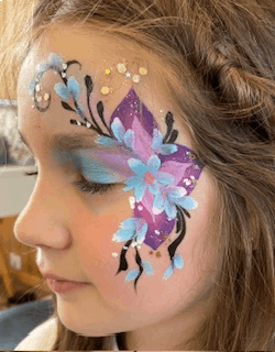 Fleurs bleues fond mauve Maquillage fleurs bleues